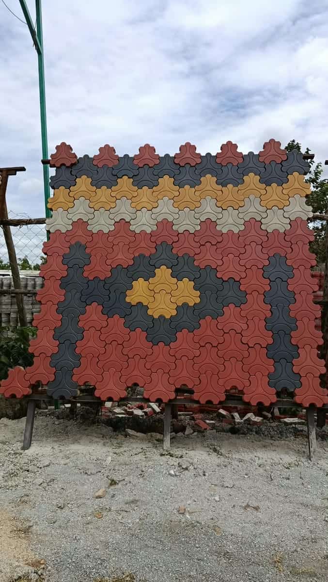 Trihex cabro display panel showing a red field with charcoal, grey and yellow diamond pattern in the yard